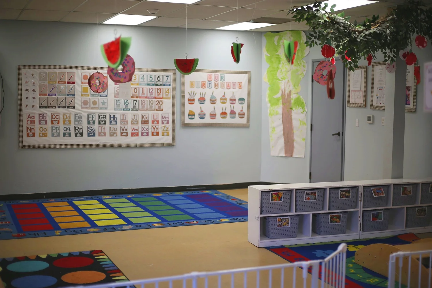 Golden Poppy preschool classroom with a colorful circle-time rug