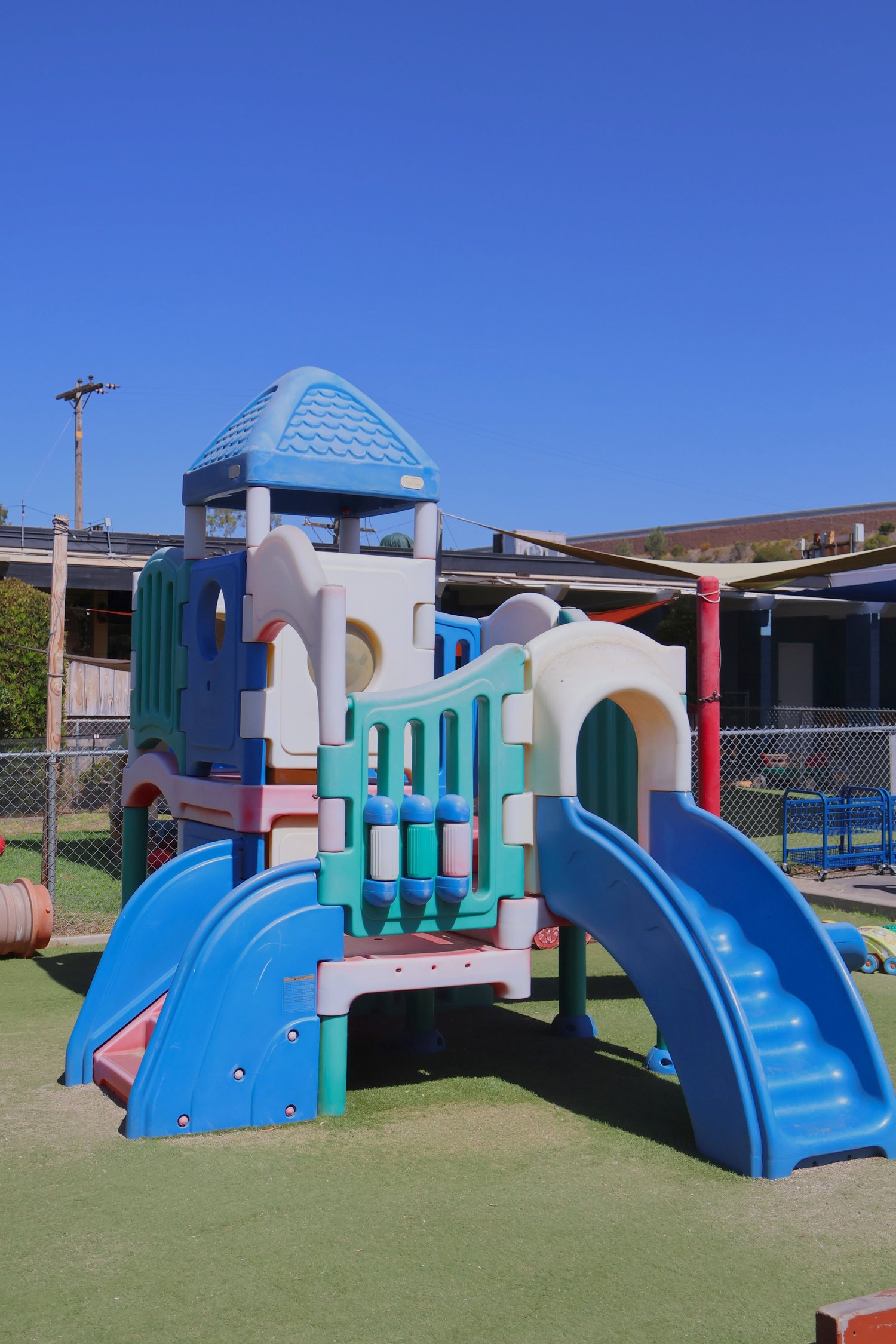 The center’s outdoor climbing structure and slides
